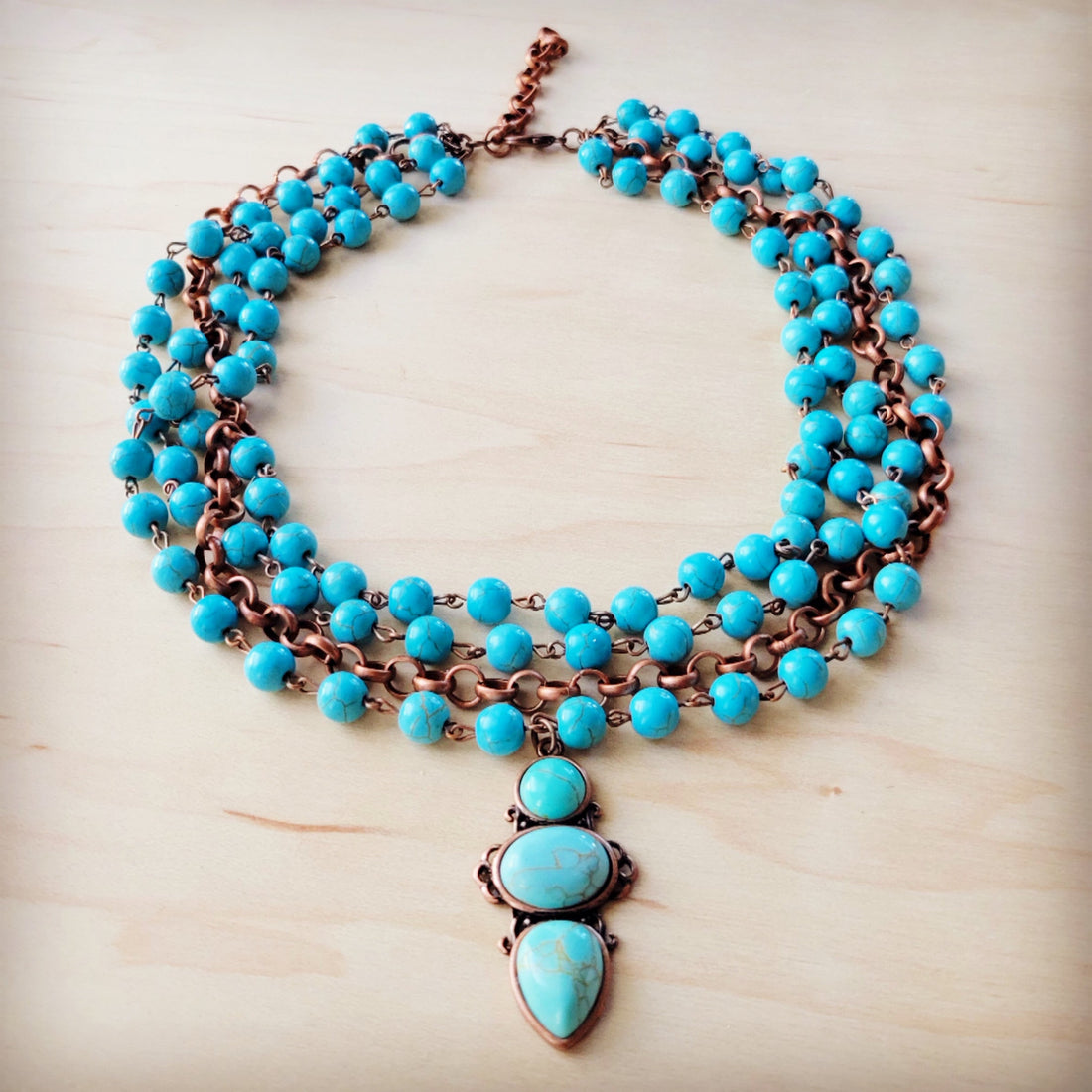 Triple Strand Blue Turquoise Bead Necklace with Copper Pendant - Image 2
