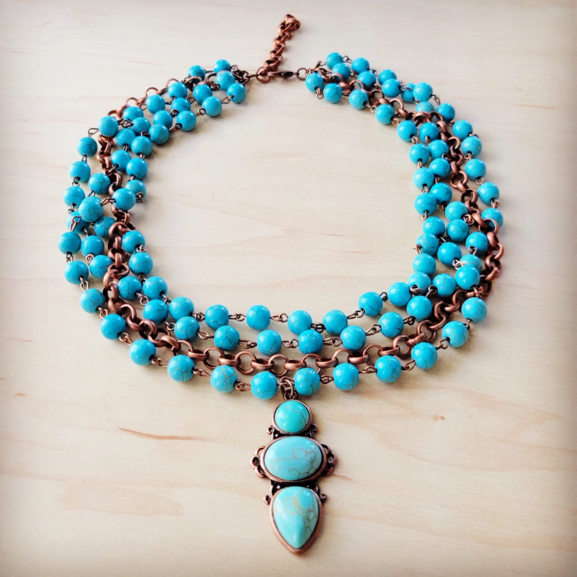 Triple Strand Blue Turquoise Bead Necklace with Copper Pendant - Image 2