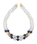 Two-strand necklace featuring frosted glass, blue lapis, textured brass, and white biwa pearls with a gold-tone magnetic clasp.