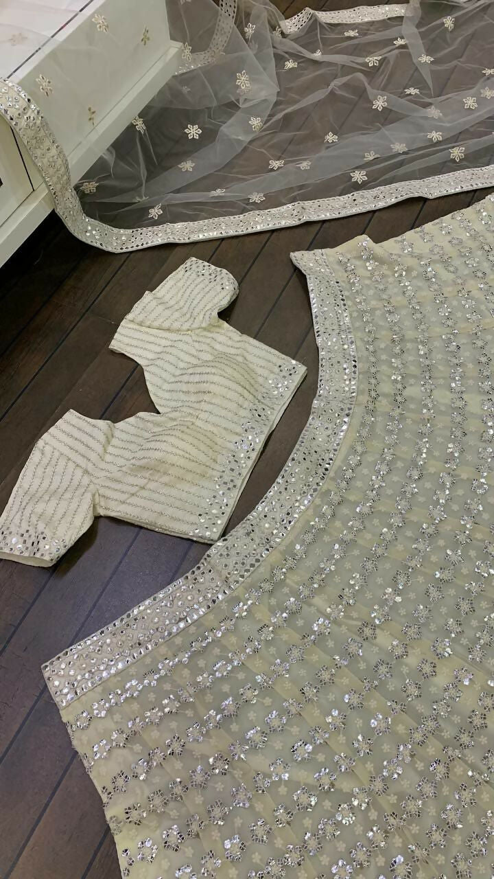 Cream Georgette Lehenga Choli with Paper Mirror Thread Embroidery