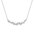 Close up of 999 Sterling Silver smile bar necklace featuring sparkling CZ cluster stones
