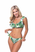 Women wearing a tropical green and white floral print bikini set with ruffle trim details and tie-side bottoms.