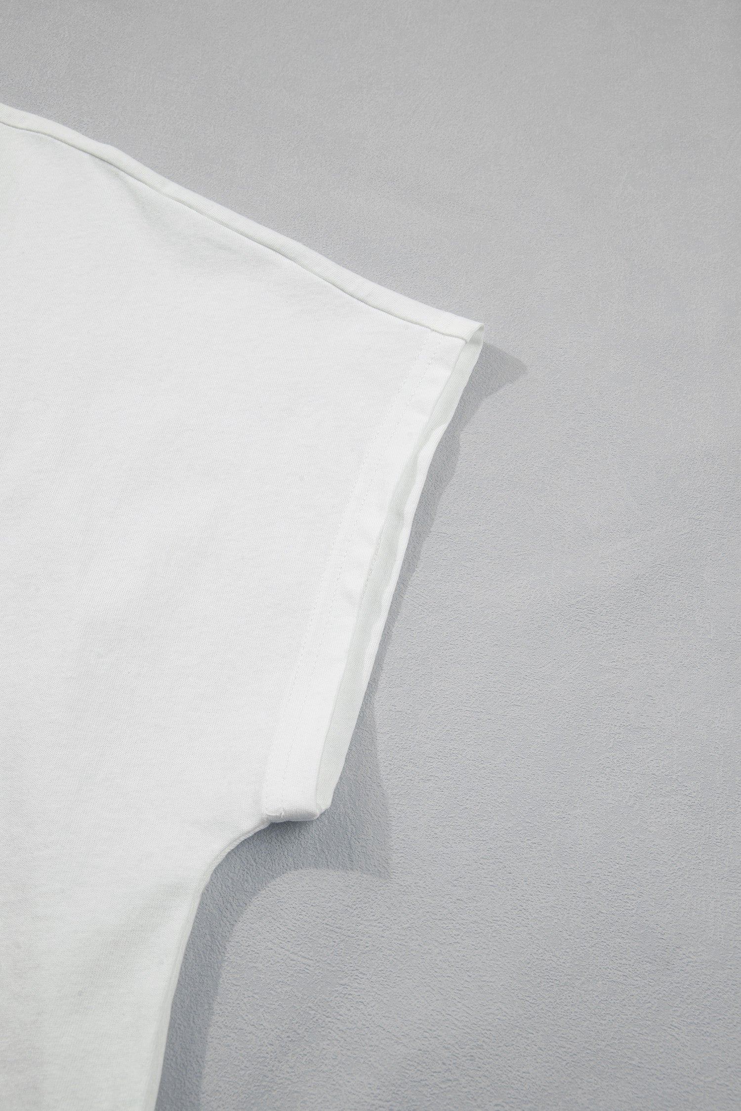 White T-Shirt with Leopard Bow Embroidery Patch Relaxed Fit - Image 5