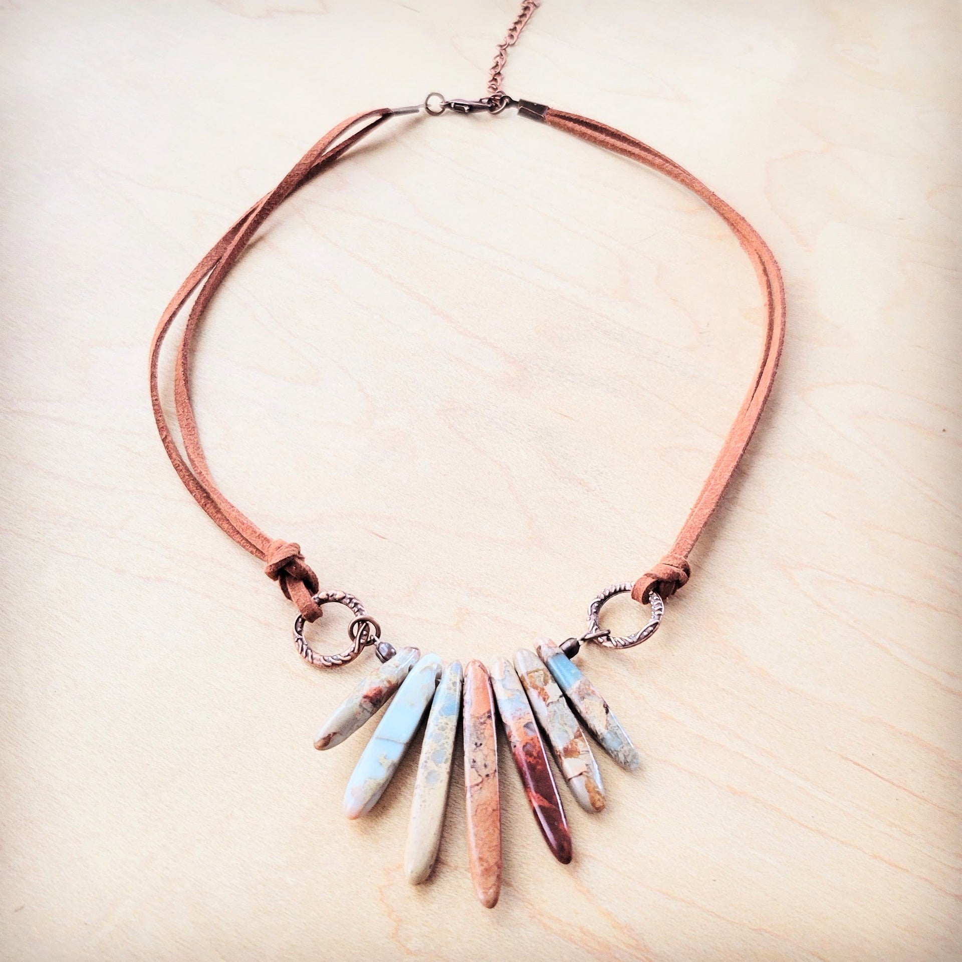 Aqua Terra Jasper stone slab fan necklace on a brown vegan leather cord with copper-tone accents