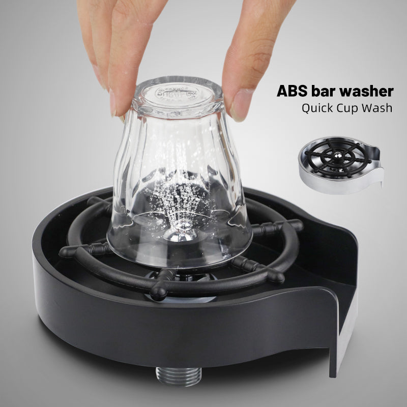 Automatic high-pressure cup washer installed on a kitchen sink for rinsing coffee pitchers