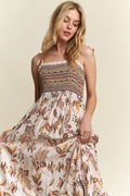 Smocked printed cami dress with tie shoulders in cream, brown, and orange