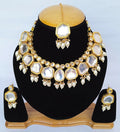 Stunning white Kundan stone necklace set with gold-plated finish and adjustable cord