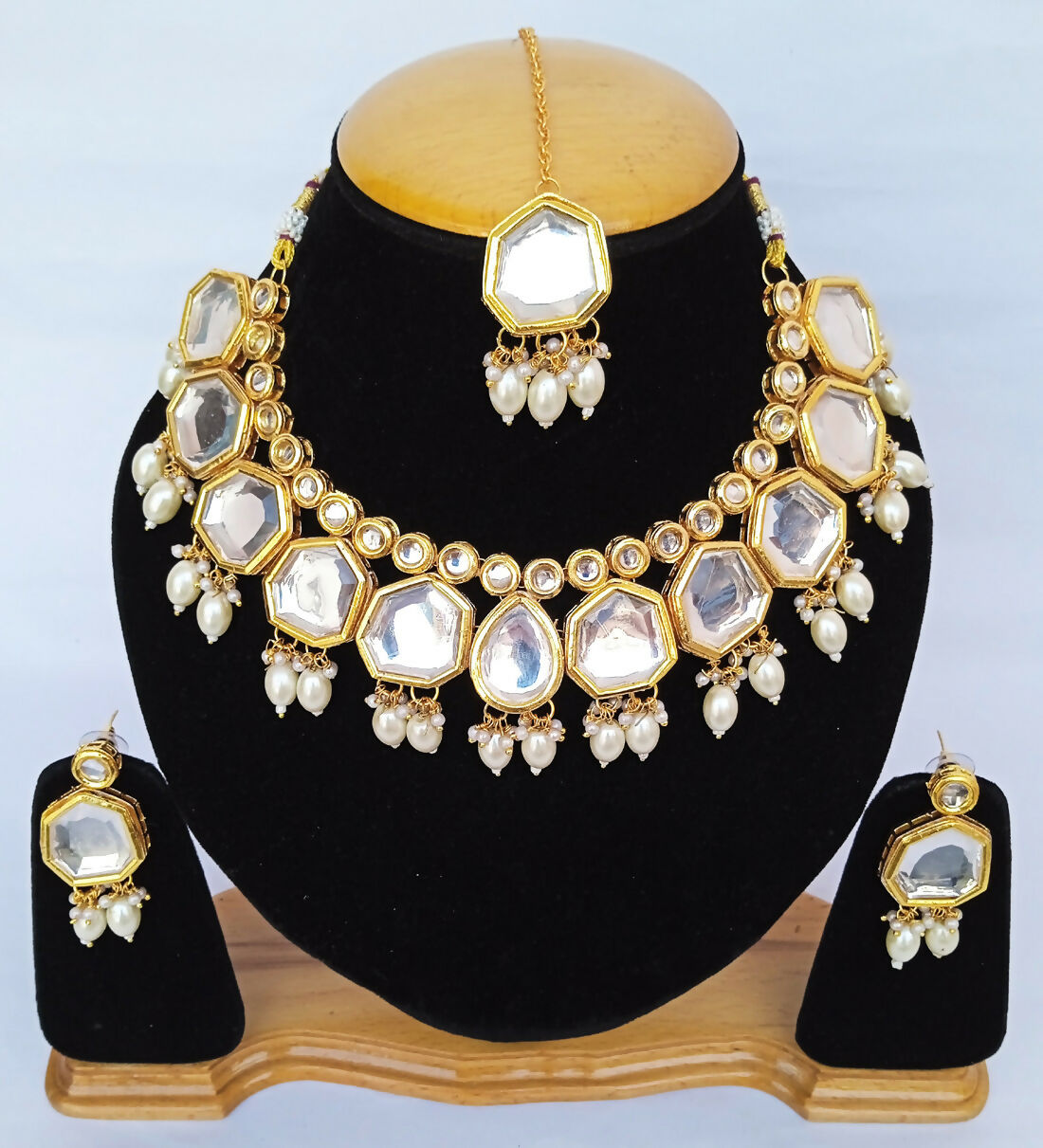 Stunning white Kundan stone necklace set with gold-plated finish and adjustable cord
