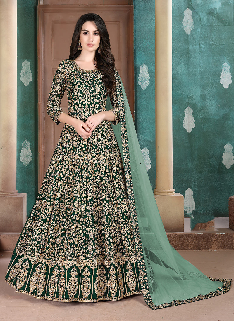Dark green georgette salwar kameez with intricate embroidery