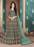 Dark green georgette salwar kameez with intricate embroidery