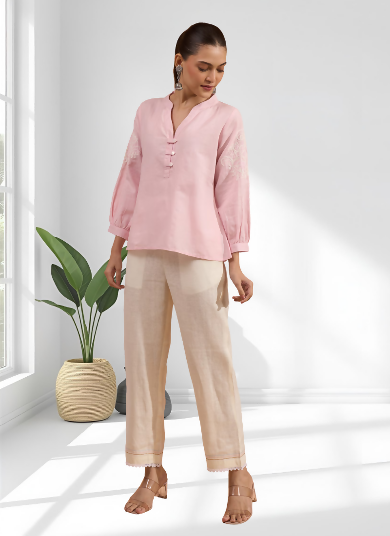 Pink cotton and linen tunic with delicate embroidery and split V-neck detail