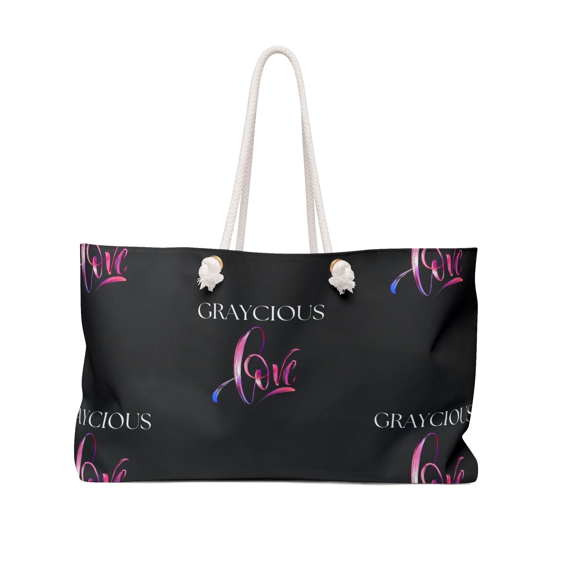 An oversized wide-mouthed Weekender Tote bag featuring thick, durable rope handles.