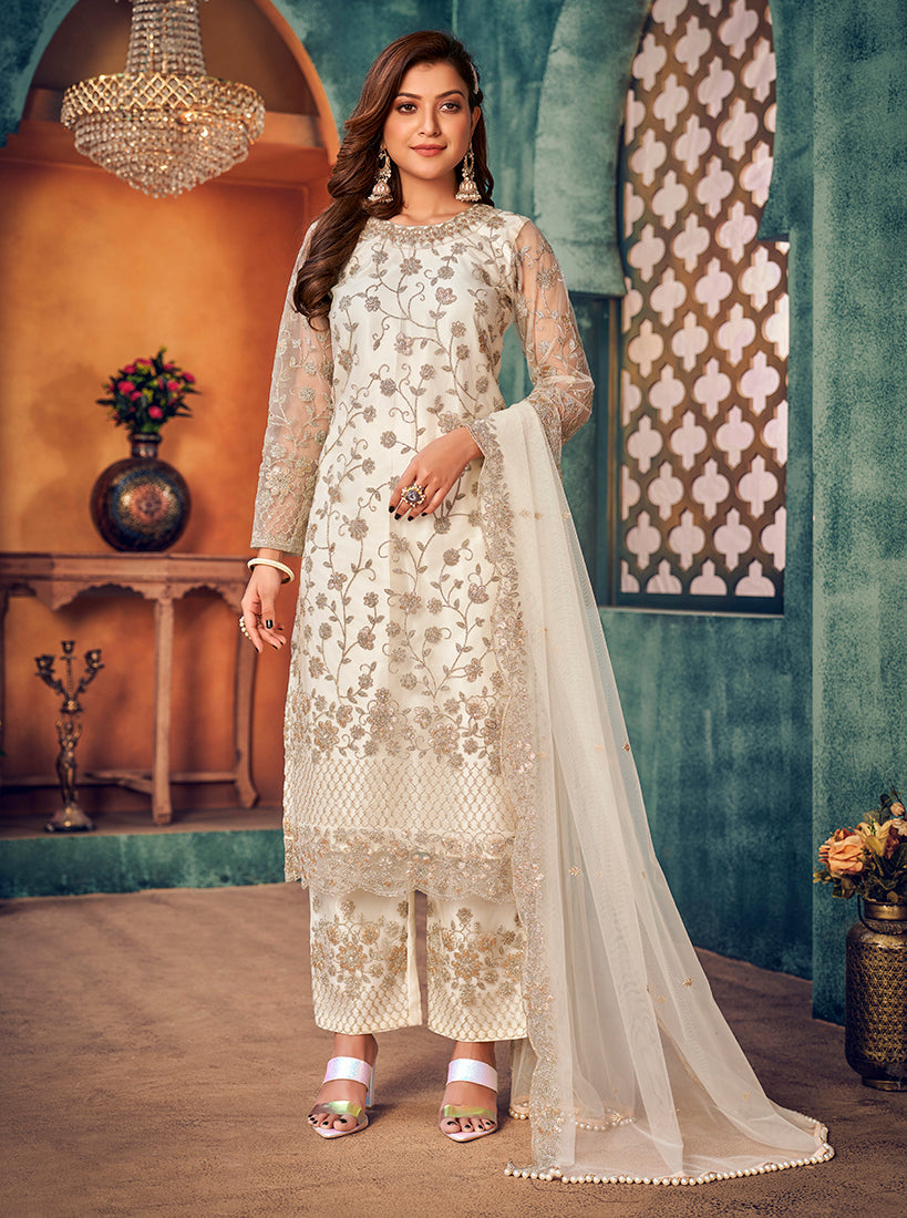 Elegant white net Pakistani salwar kameez with detailed embroidery