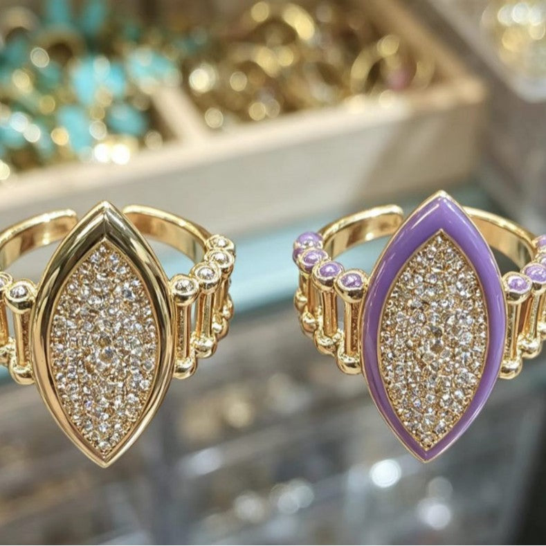 Adjustable water-drop geometric ring with diamond accents in gold and purple finish