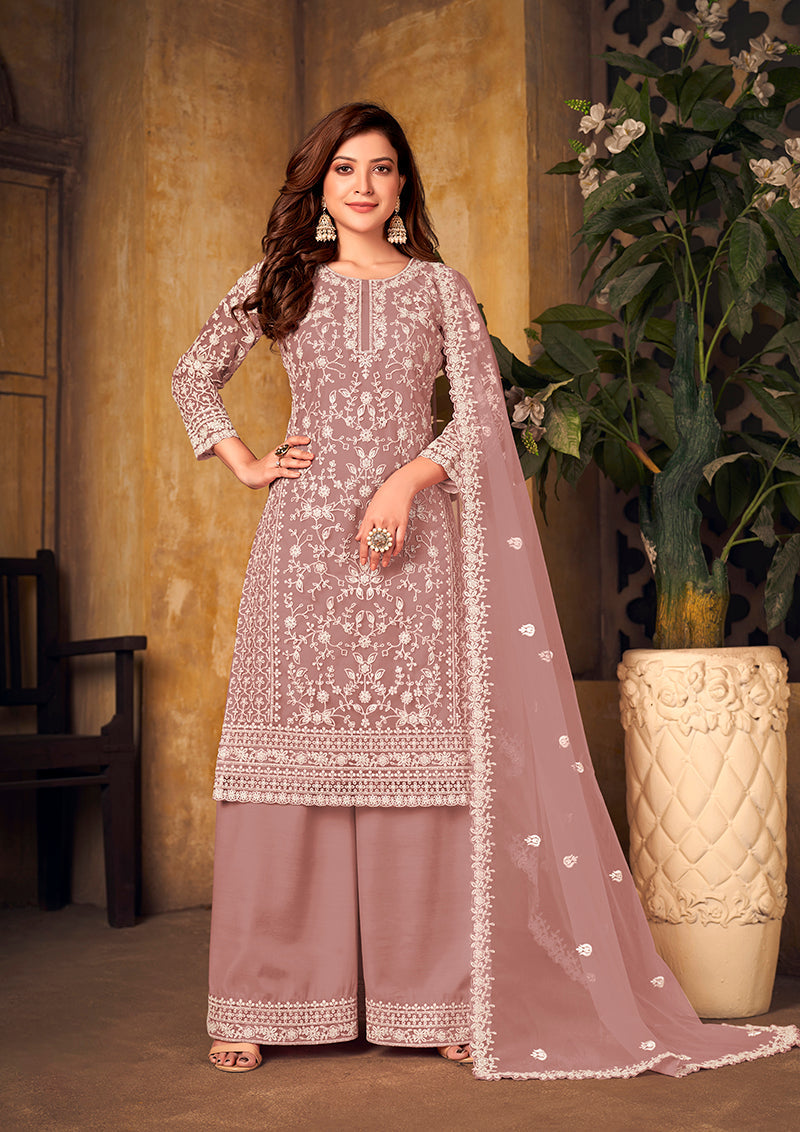 Elegant mauve net palazzo suit with delicate zari embroidery.