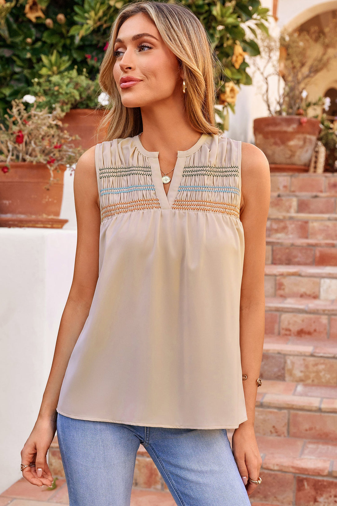 Woman wearing Josephine Stitch Sleeveless Shift Top in beige multi-color pattern
