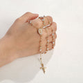Retro Beaded Cross Necklace in Gold Tone Alloy