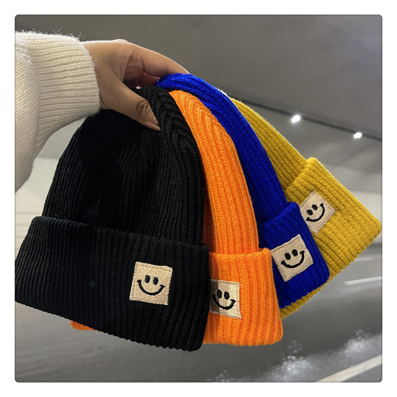 Women’s Knitted Smiley Face Beanie - Warm Winter Cuffed Hat - Image 3