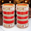 Designer red bridal chura set for traditional Punjabi weddings