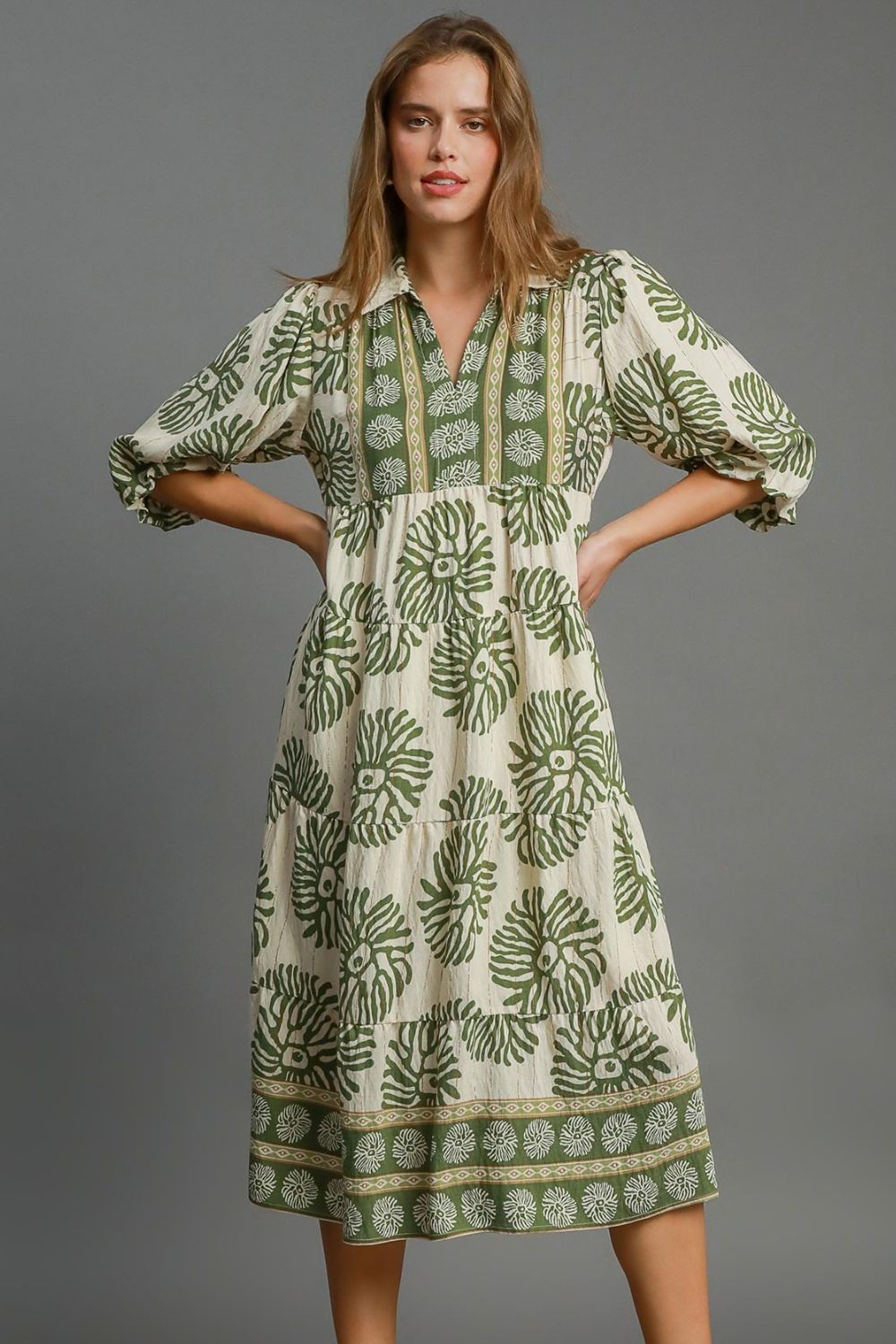Matcha green and cream floral midi dress in a soft cotton fabric.