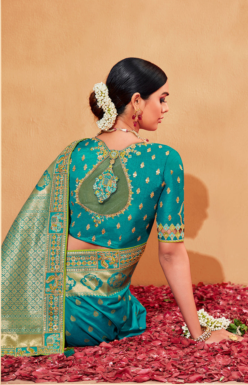 Turquoise heavy silk embroidered half and half designer saree
