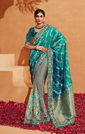 Multi-color heavy silk half and half saree with blue and grey tones and ethnic border