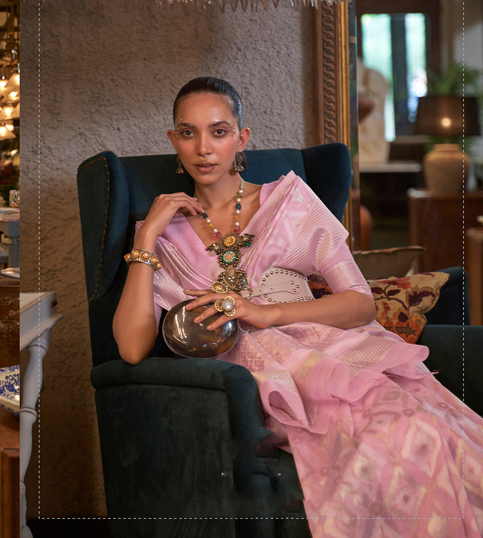 Light Pink Linen saree featuring woven zari borders and included blouse