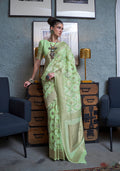 Light Green Linen saree with intricate woven zari border and matching blouse piece
