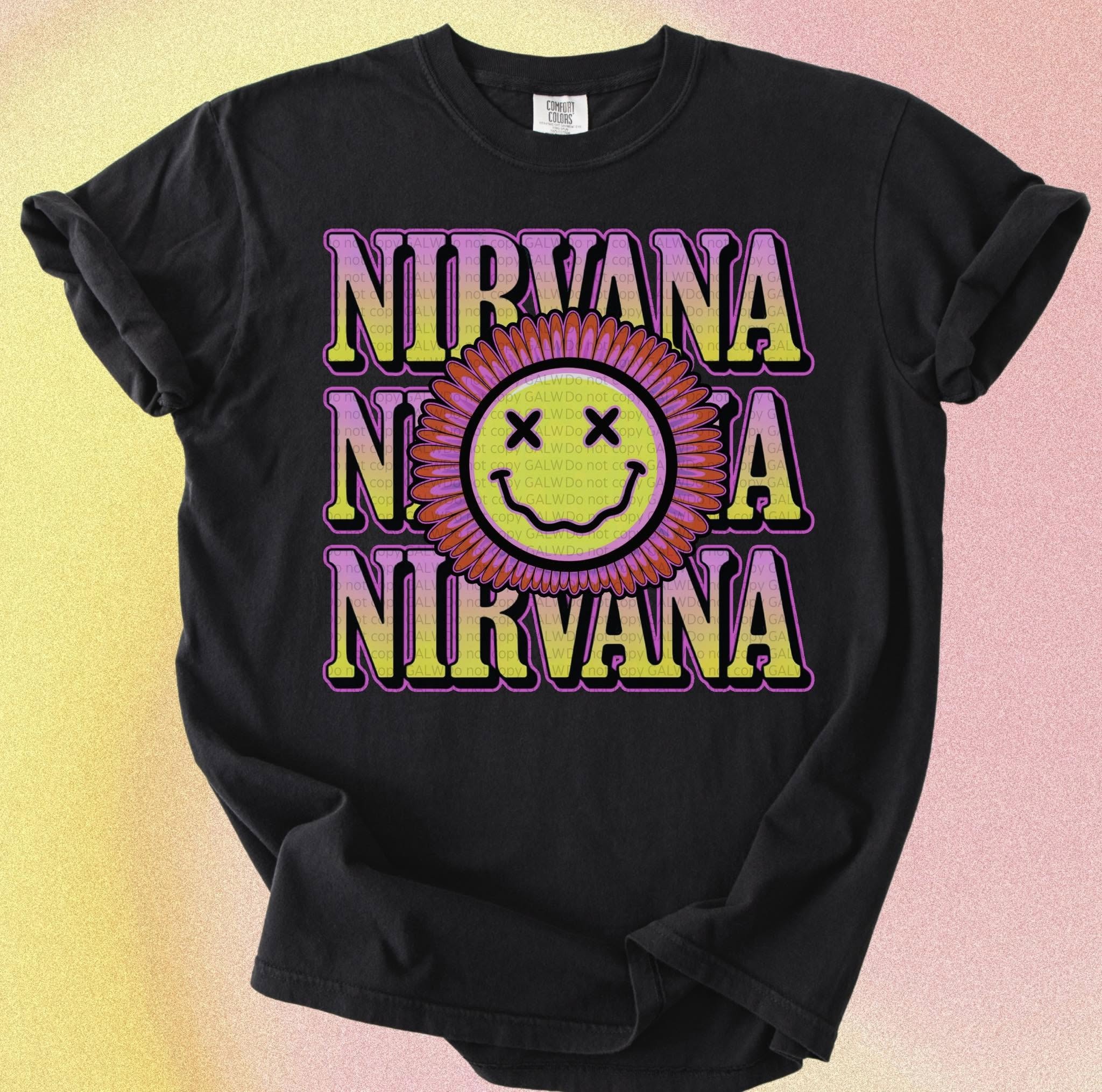 Black t-shirt with Nirvana logo featuring a smiley face on a gradient background