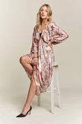 Vibrant printed summer dress with V-neckline and relaxed batwing sleeves
