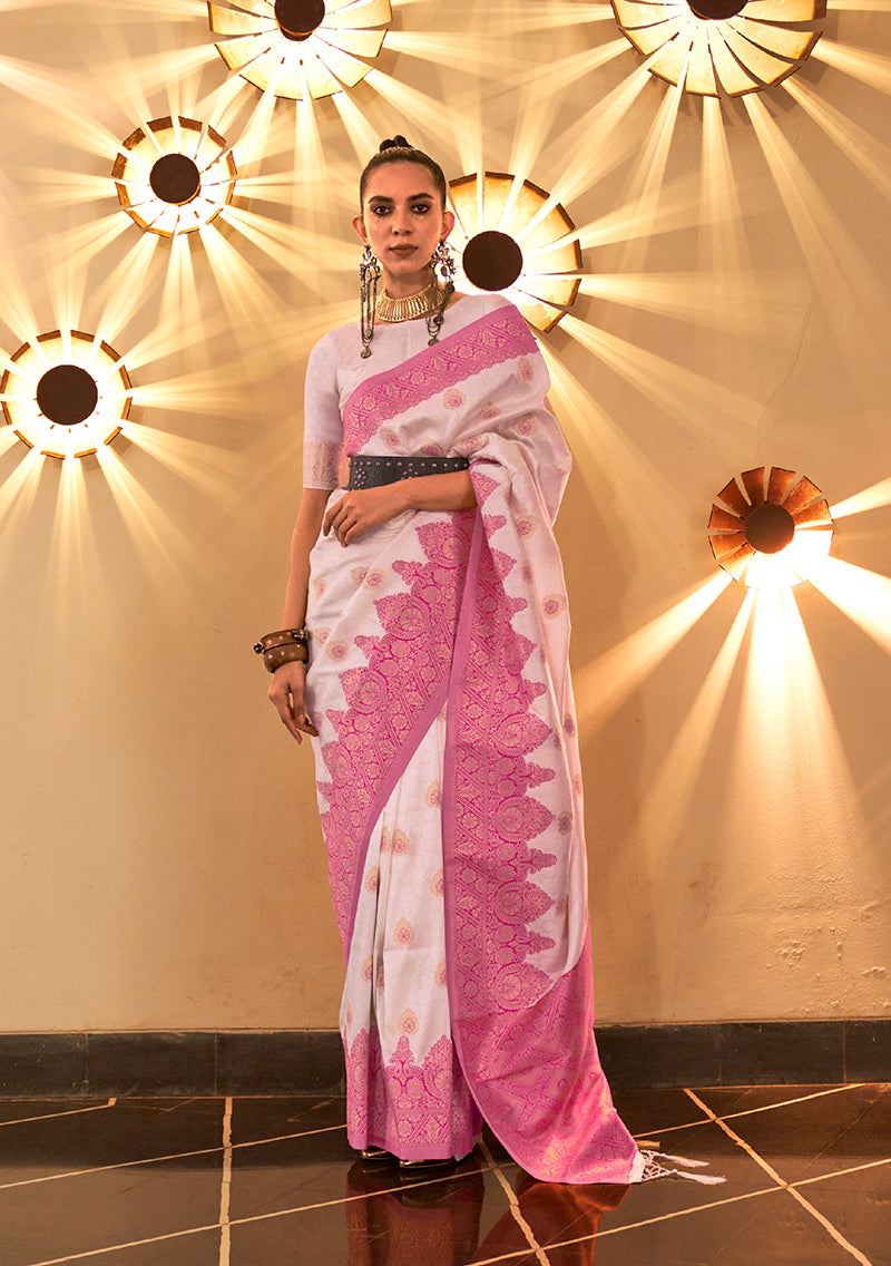 White handloom silk saree with intricate Banarasi patterns and a matching blouse