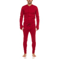 Men wearing a deep red long-sleeve merino wool union suit with crew neckline and button closure.