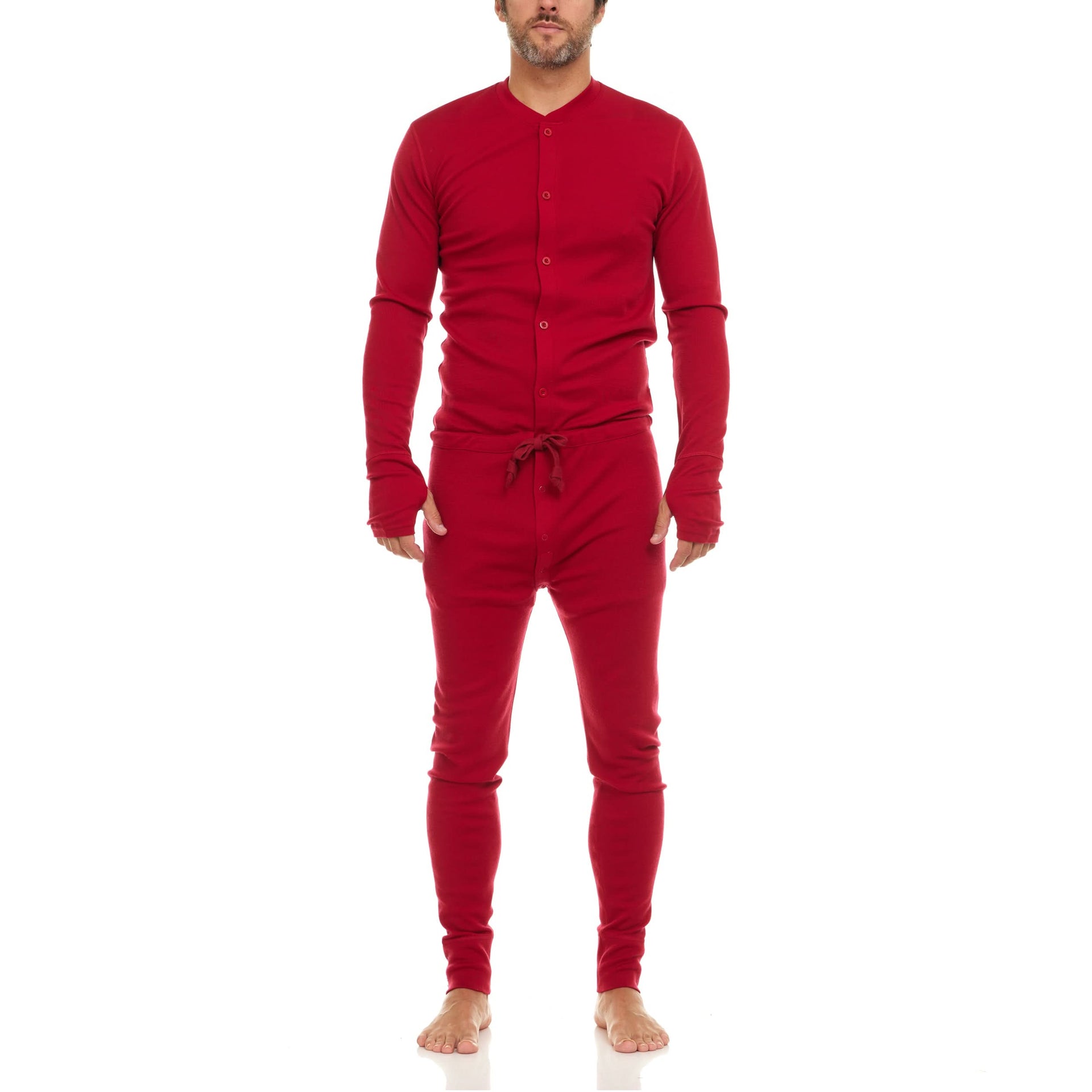 Men wearing a deep red long-sleeve merino wool union suit with crew neckline and button closure.