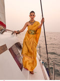 Yellow pastel satin saree featuring elegant traditional two-tone handloom weaving