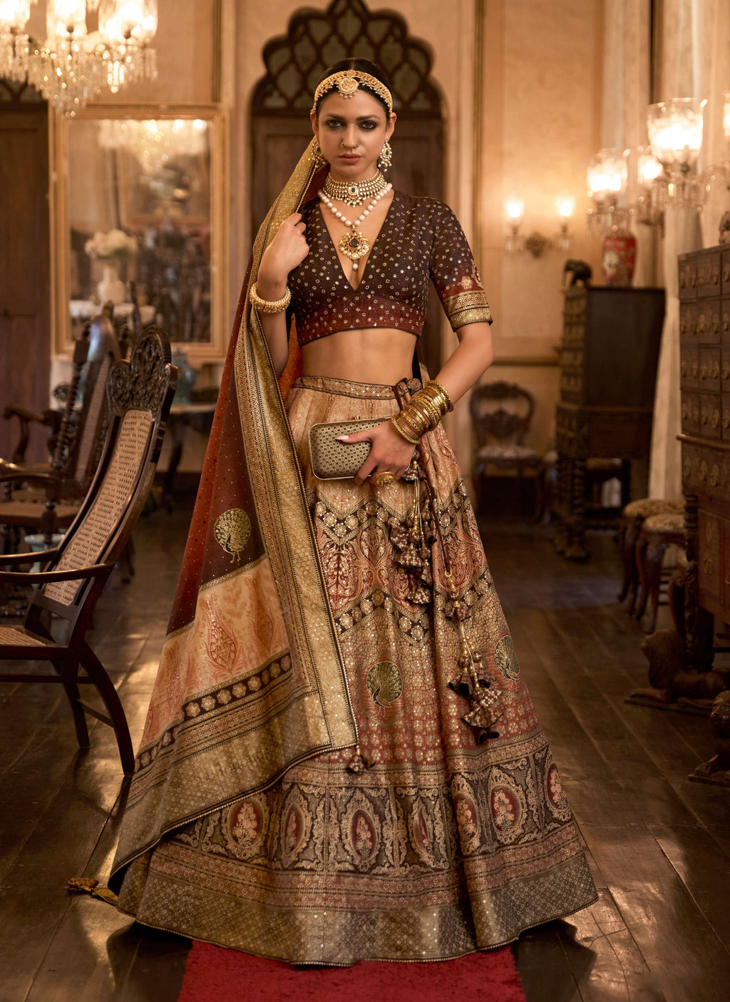 Peach Rajwadi Silk lehenga choli with ethnic prints and sequin embellishments