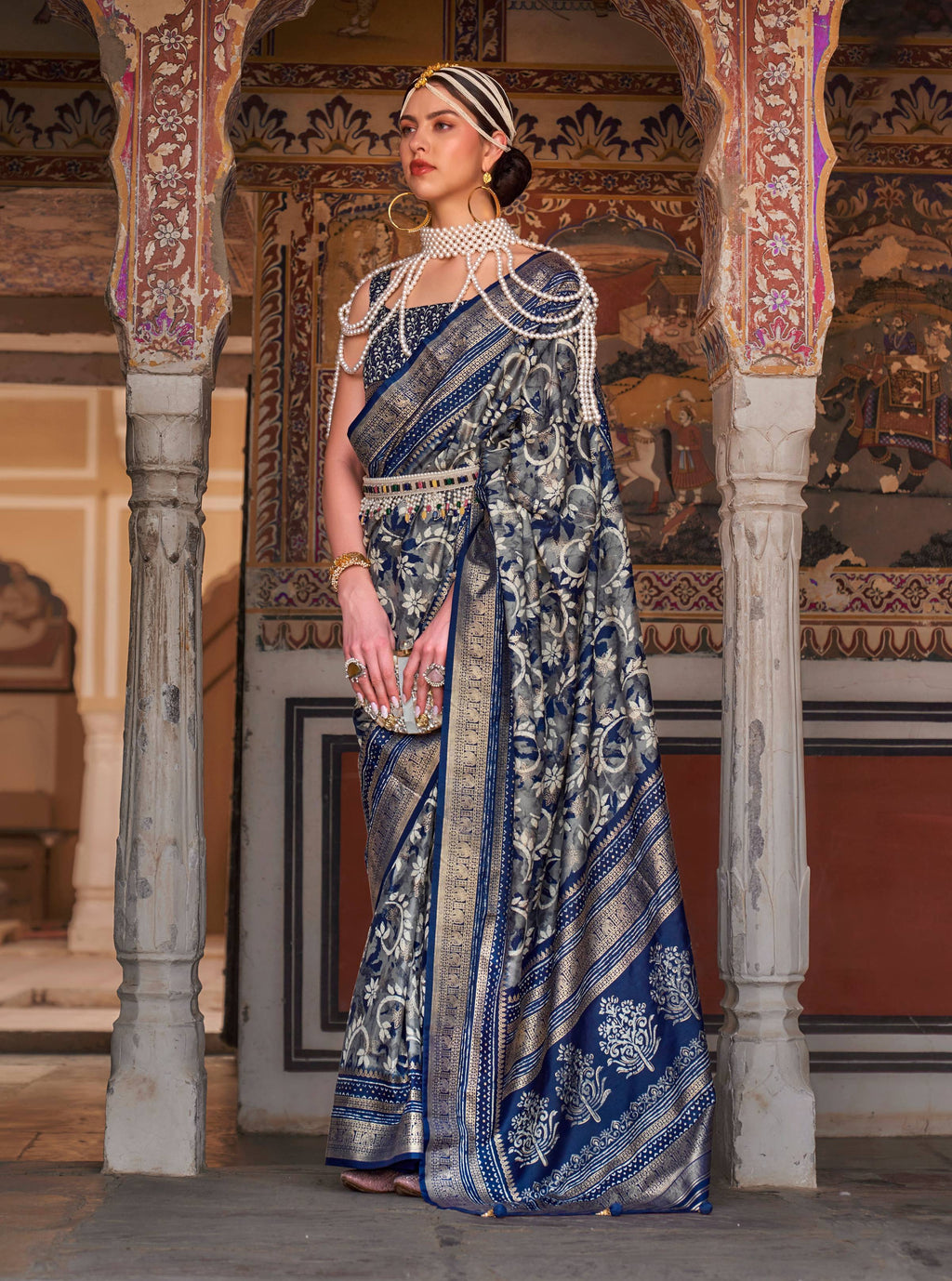 Navy blue silk saree with intricate Ajarak print and zari border