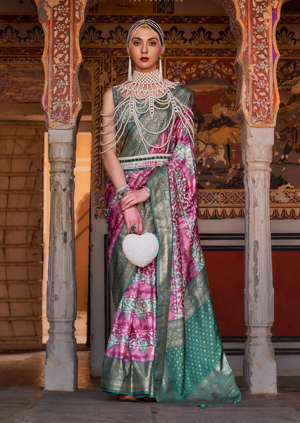 Pink and Green silk saree with Ajarak design and zari work