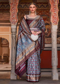 Cobalt blue silk saree with Ajarak patterns and gold zari work details
