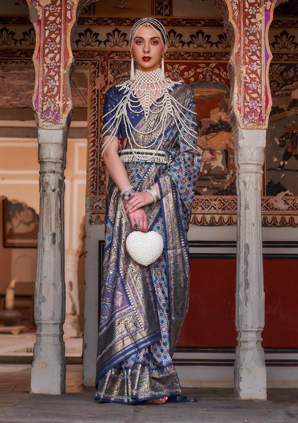 Elegant Blue silk saree with Ajarak motifs and intricate zari work