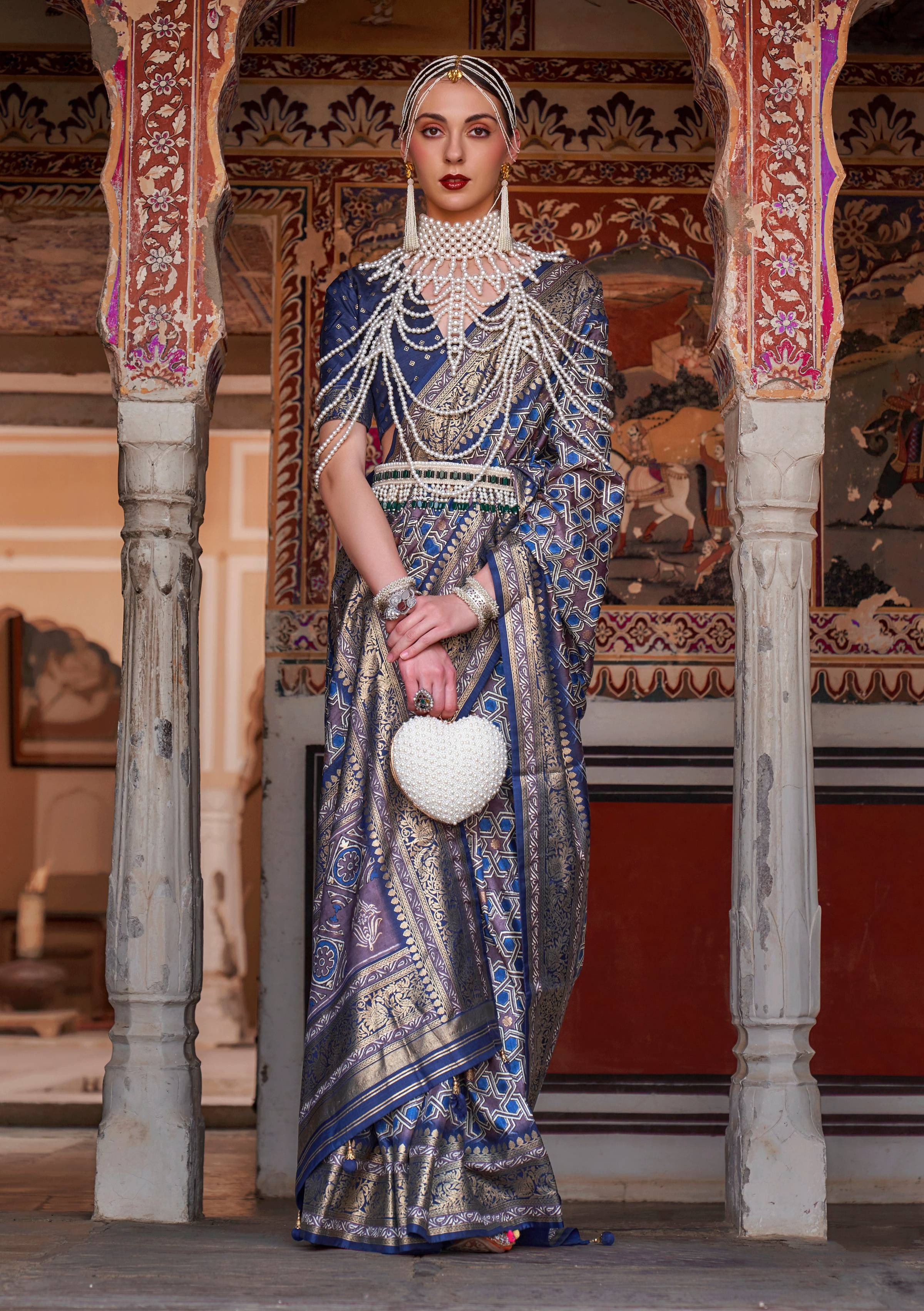 Elegant Blue silk saree with Ajarak motifs and intricate zari work