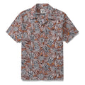 Men wearing a vintage brown, white, and orange Hawaiian shirt with Tiki Totem and shark prints