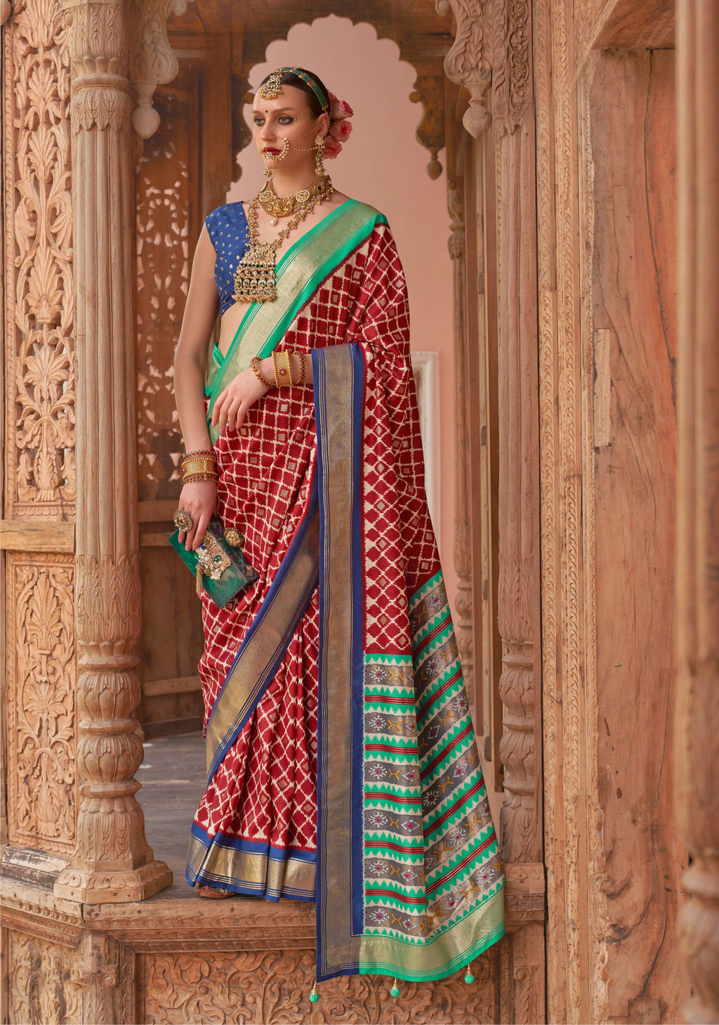 Bright red Patola silk saree with elegant weaving work
