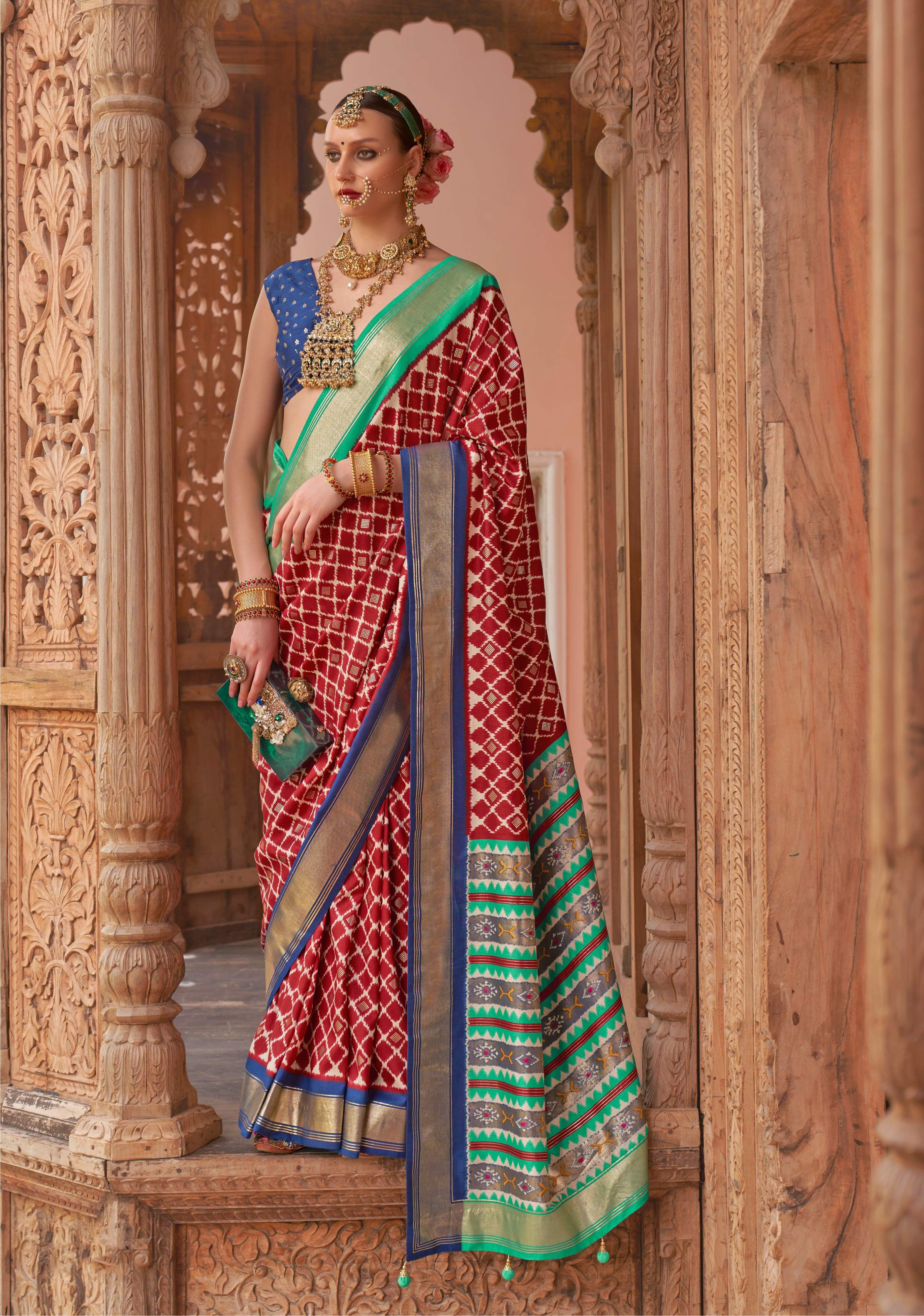 Bright red Patola silk saree with elegant weaving work
