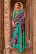 Purple Patola silk saree with intricate weaving work and matching blouse