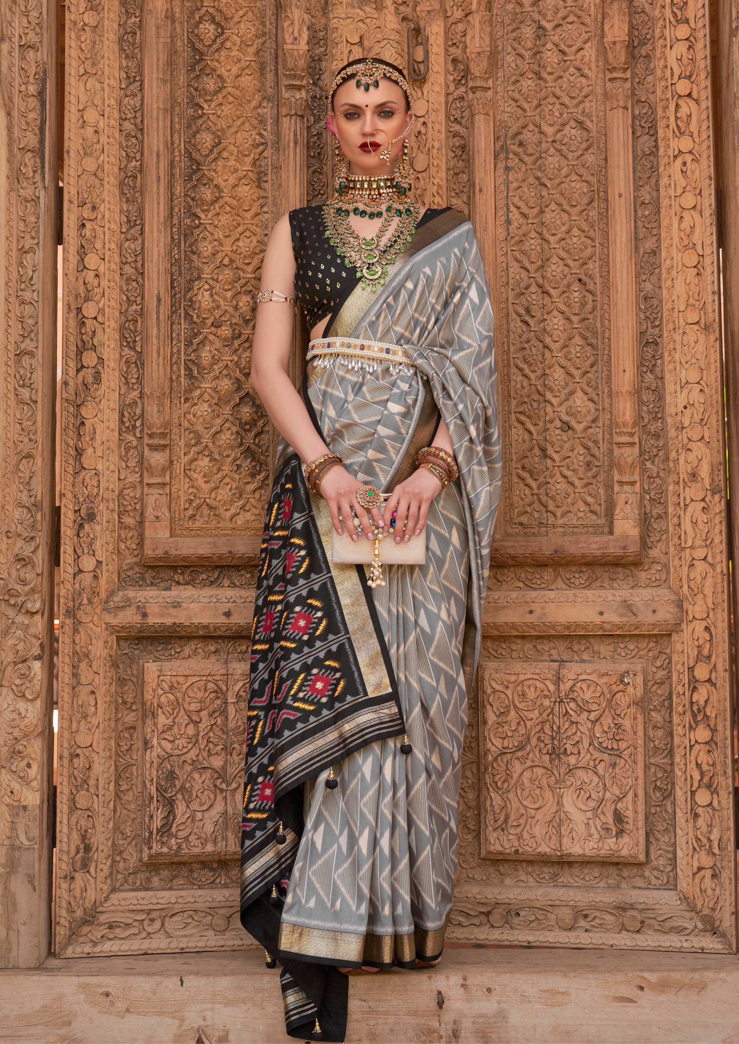 Light grey Patola silk saree with weaving work and matching blouse