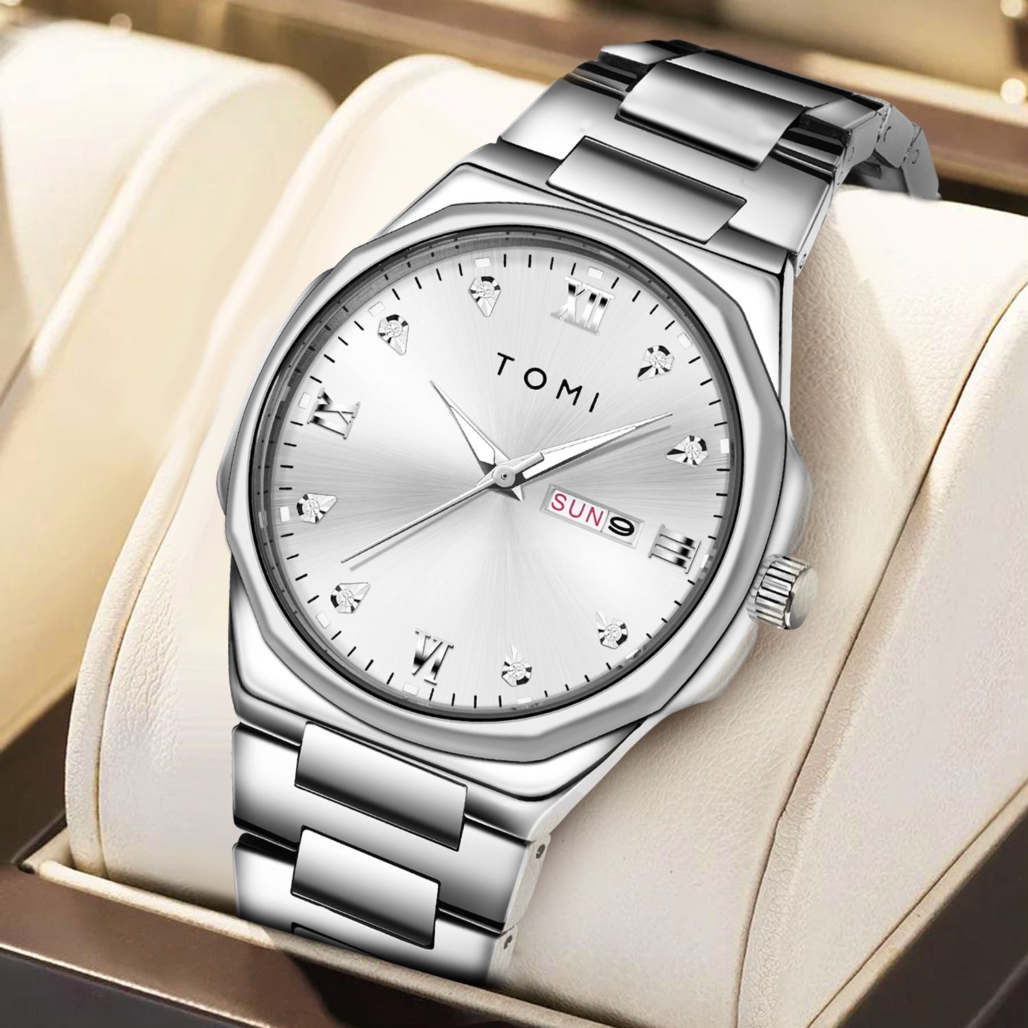 A fashionable silver stainless steel quartz watch with diamond encrusted details on the face.