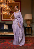 Lavender color silk saree with detailed traditional ethnic weaving