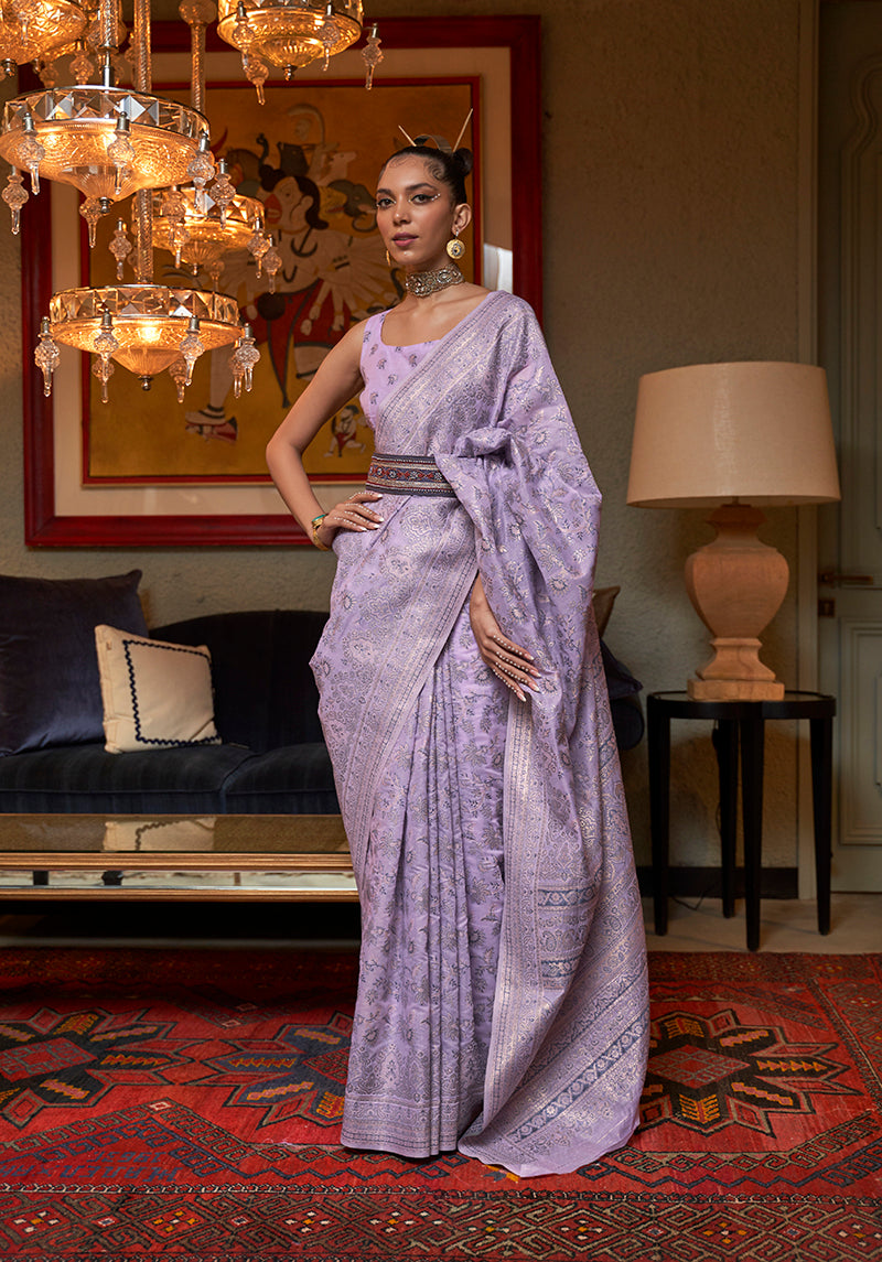 Lavender color silk saree with detailed traditional ethnic weaving