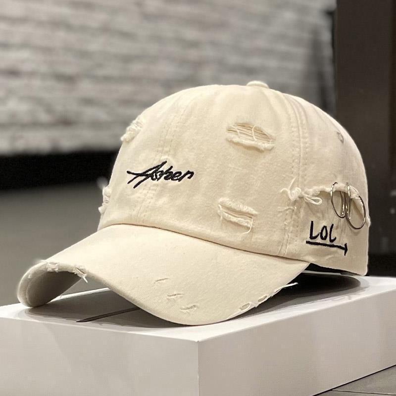 Korean style distressed tie-dye baseball cap with letter print, available in beige, grey, and white.