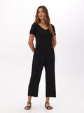 A comfortable and stylish short sleeve modal terry jumpsuit in a versatile fall design.